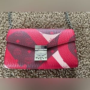 Mcm crossbody bag with adjustable strap perfect color for summer